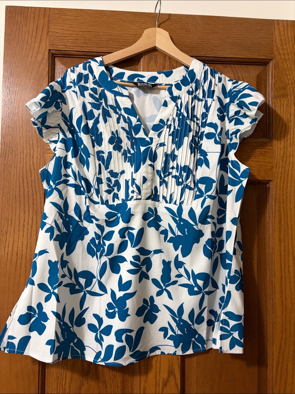 BloomChic White Top with Blue Floral Print and Pintuck Front